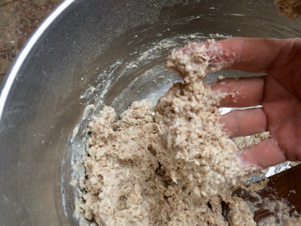 Add the butter milk and stir, either using a wooden spoon or your hands, to obtain a “porridge-like” dough.  It will be quite wet, almost a batter.