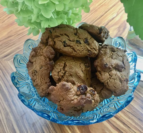 Using two soup spoons, scoop up a generous tablespoon of dough and drop it onto the baking sheet, leaving about 1-inch (2.5cm) between each cookie.